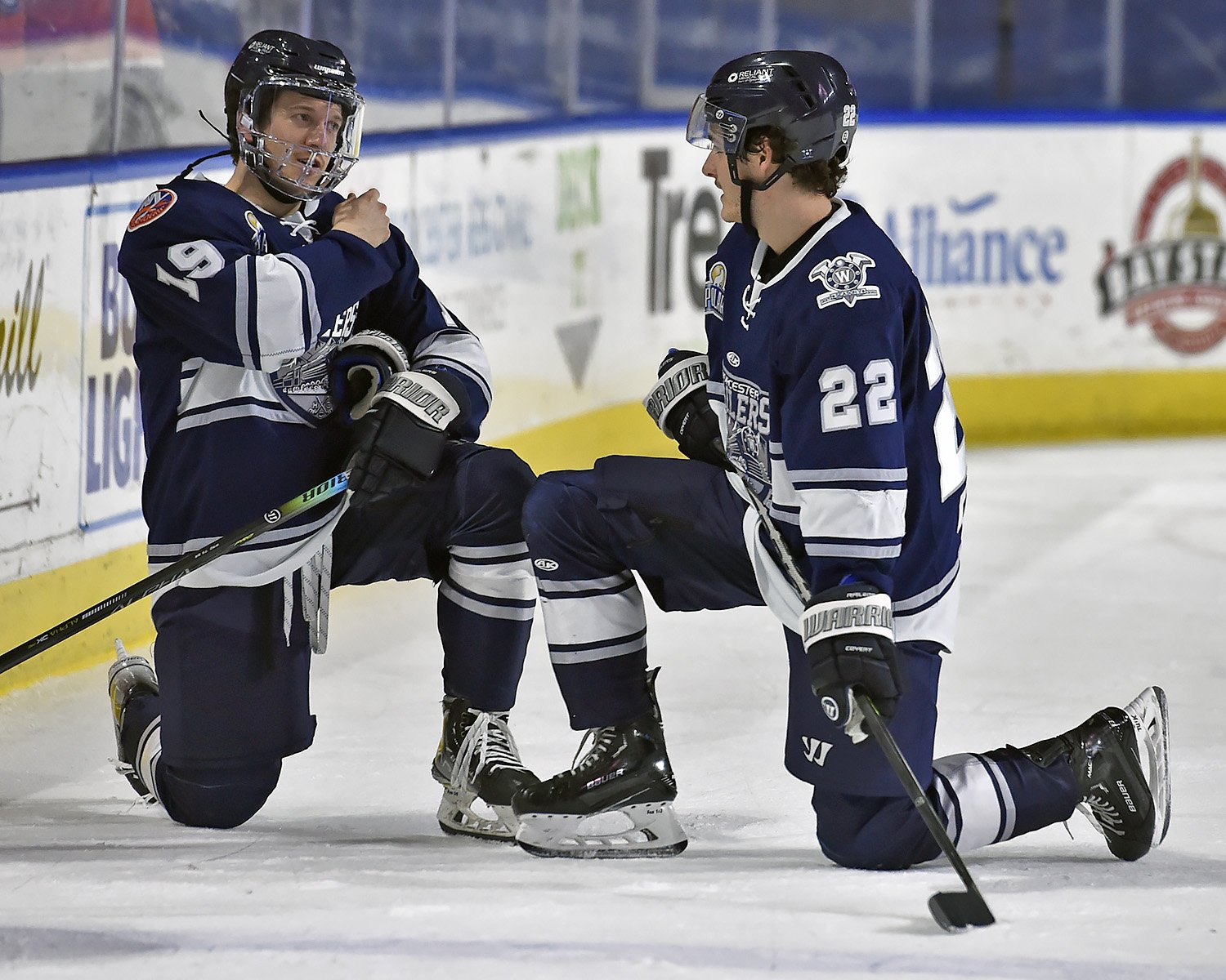 Teammates talking on the bench
